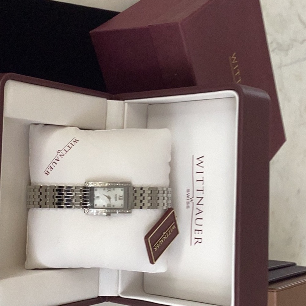 Women’s Wittnauer Swiss Quartz diamond bezel SS MOP dial watch. Deployant buckle